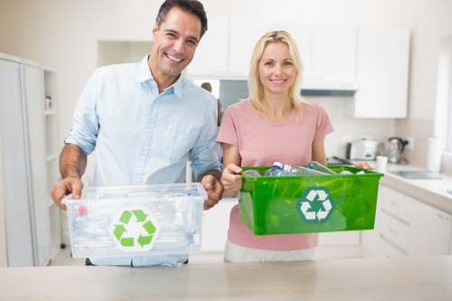 Experienced technicians handling garage clearance tasks